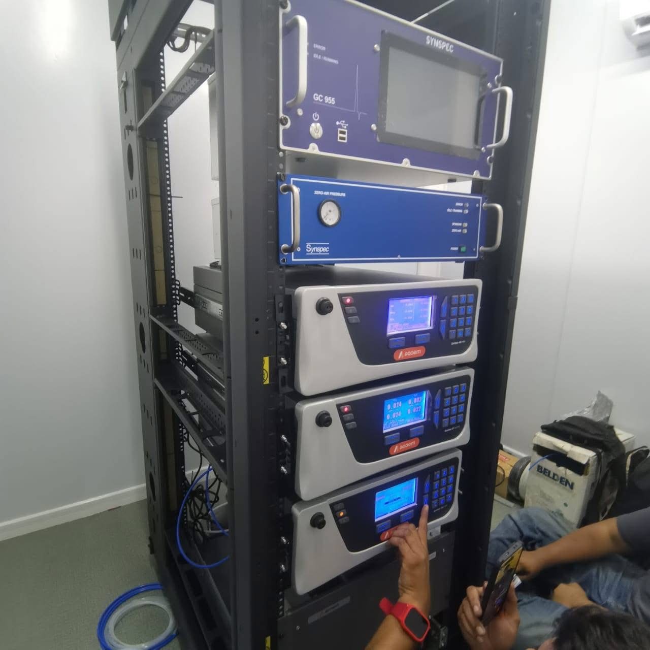 Environmental analysis instruments installed in a monitoring station equipment rack